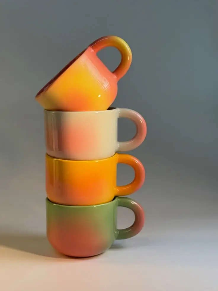 Orange Ceramic mug styled on a cozy coffee corner with aesthetic home decor